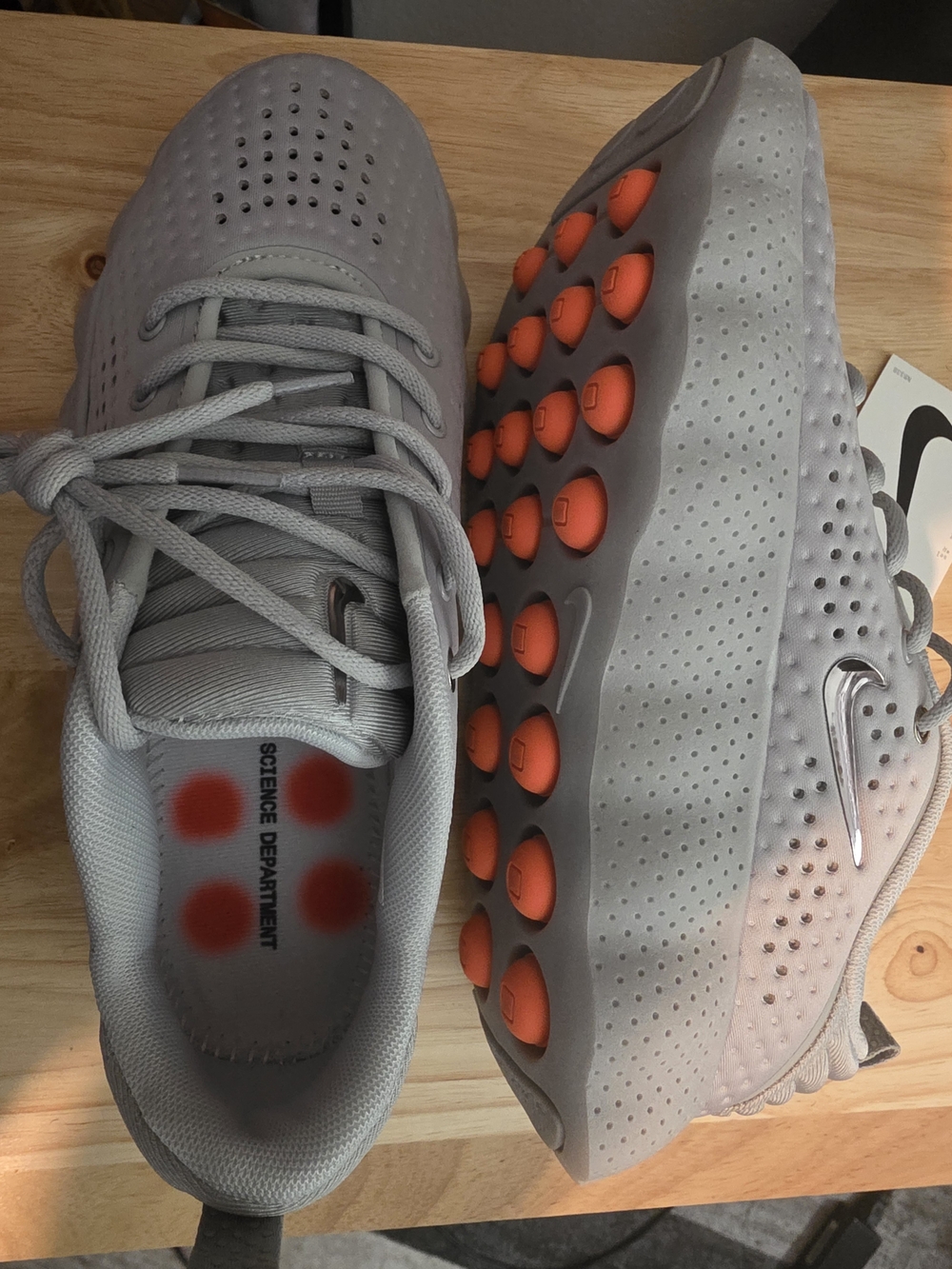 Nike Men’s Grey Athletic Shoes with Orange Accents